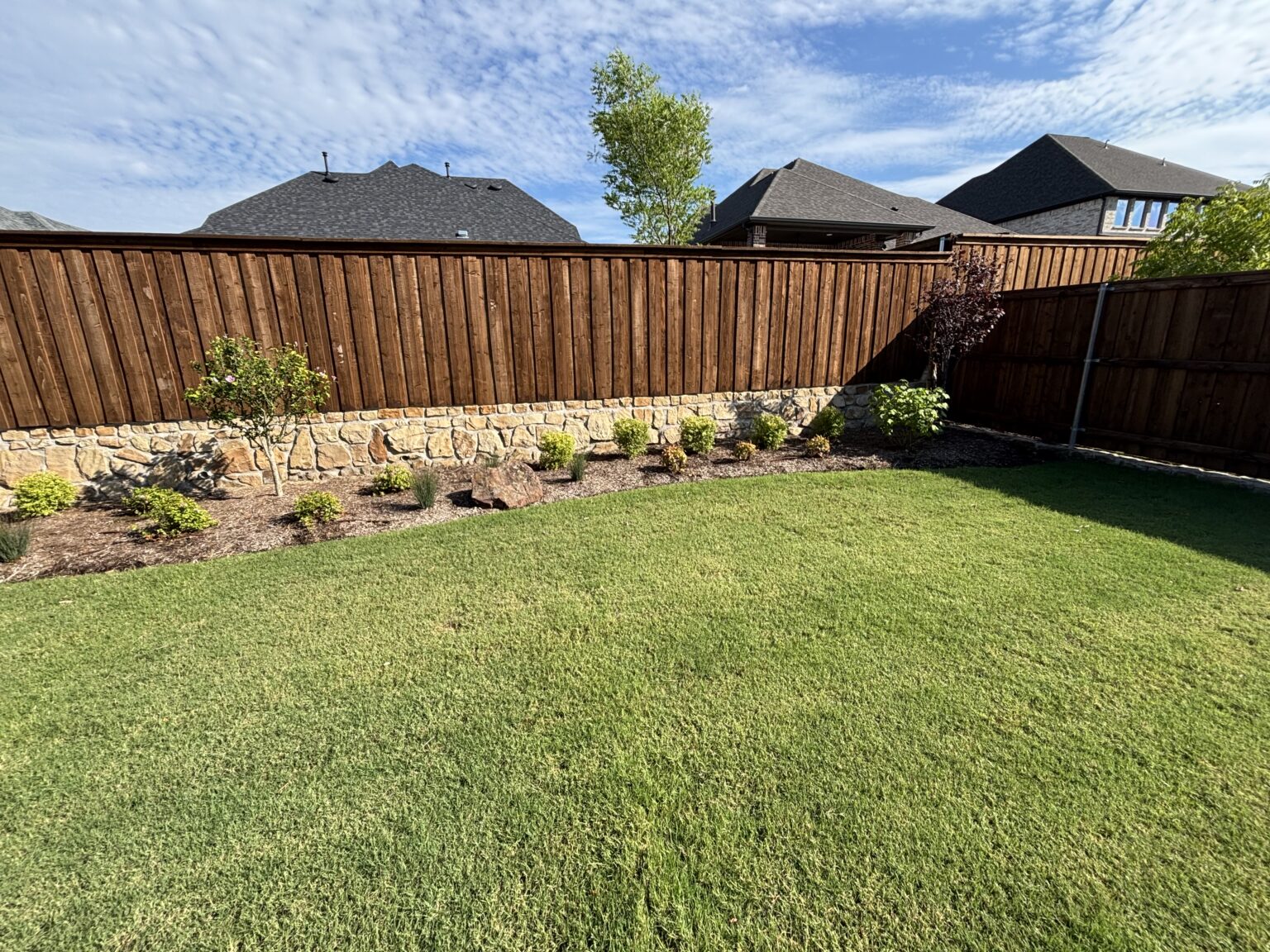 Finished backyard landscape design Allen TX