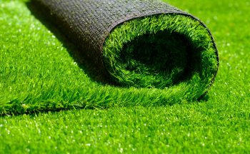 artificial rolled green grass; closeup